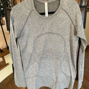 Lululemon long sleeved shirt.  New without tags.  Never worn!